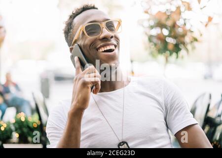 African man using mobile phone. Stock Photo