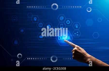 Male Hand Clicking On Data Button On Digital Screen With Multimedia Icons Stock Photo