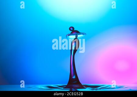 Closeup shot of wonderful splash of blue liquid on abstract background Stock Photo