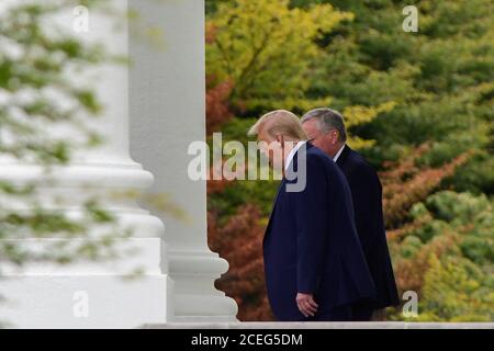 US President Donald Trump, right, is joined by White House Chief of Staff Mark Meadows as he departs the White House, in Washington, DC, Tuesday, September 1, 2020, to meet with law enforcement officials in Kenosha, Wis. Credit: Rod Lamkey/Pool via CNP /MediaPunch Stock Photo