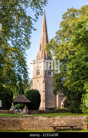Evening light on St Marys church in the Cotswold village of Lower Slaughter, Gloucestershire UK Stock Photo