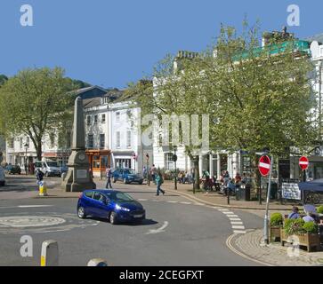 Throundabout at the bottom of Fore Street, Totnes a unique town in Devon, known for being twinned with Narnia. A memorial to William John Wills pays t Stock Photo