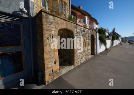 Beautiful historic Lyme Regis Dorset UK.  UNESCO site, famous fossil beach and for The  Cobb. Sandy and pebble beaches on South West coast path. Stock Photo
