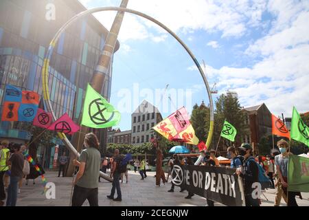 Cardiff, Wales, UK. 1st September 2020. Extinction Rebellion protestors take over Cardiff and march on the Senedd to demand a green recovery and passing of the CEE Bill on day one of a week of action. Protestors march past the National Library of Wales Credit: Denise Laura Baker/Alamy Live News Stock Photo