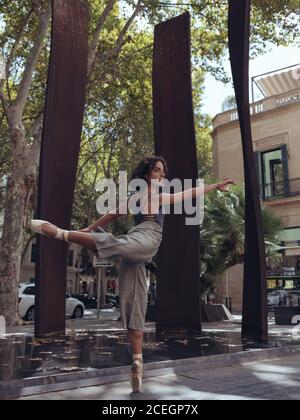 Woman dancer posing on street Stock Photo