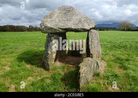 Bodowyr Burial Chamber in Anglesey, North Wales is thought to be Neolithic and known as a dolmen or passage grave. Stock Photo