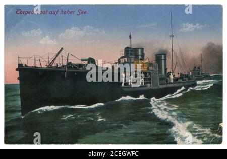 German historical colorized photo postcard: Torpedo boat on a high wave in the open sea, Imperial German Navy, world war one 1914-1918. Stock Photo