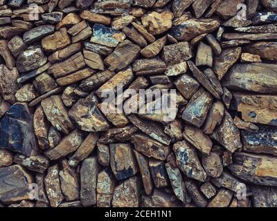Close-up rough stone abstract wall texture background. Stock Photo