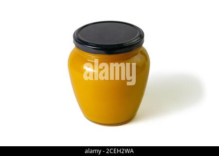 Jar of honey with flowers of acacia isolated on white background. Front views, close-up Stock Photo