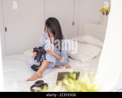 Young Woman wearing blue pajamas Stock Photo