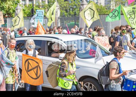 Extinction Rebellion demonstrate in Parliament Square, London as Police move in to arrest people blocking the roads Stock Photo