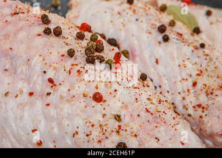 Raw turkey wings on black Slate Tray. Fresh turkey wingette on a black  stone tray Stock Photo - Alamy