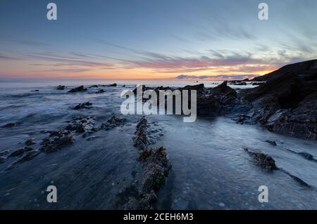 Sunset at Dollar Cove Gunwalloe Stock Photo