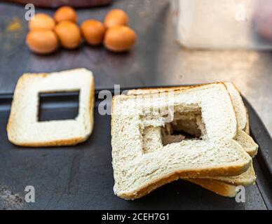 Overnight camp in the outback and Cooked Breakfast with fried eggs outback style Stock Photo