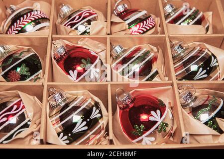 Big Set of Luxury Winterberry Glass Baubles. Retro styled image of vintage Christmas decoration in a box. Christmas holidays composition. box filled w Stock Photo