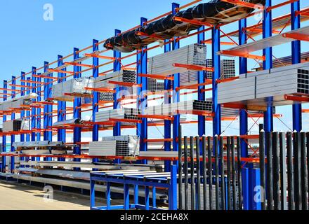 Warehouse Cantilever Racking Systems for storage Aluminum Pipe or profiles. Pallet Rack and Industrial Warehouse Racking. Steel profiles, sheet metal Stock Photo