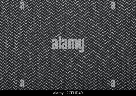 Black and white herringbone fabric pattern texture background closeup Stock Photo