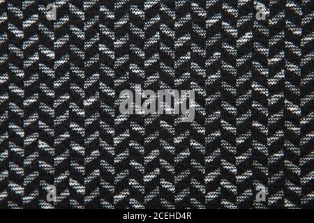 Black and white herringbone fabric pattern texture background closeup Stock Photo
