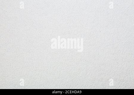 Macro shot of a terrycloth texture background. white Textile floor covering. Grey Knotted-pile carpet Stock Photo