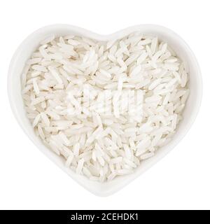 white long rice in heart shaped plate Stock Photo