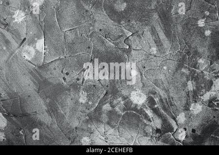 grey abstract background texture with plaster stains and splashes. Black and white Stock Photo