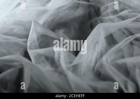 chiffon tulle fabric textured background. pleated skirt fabric texture. closeup plisse fabric texture pattern Stock Photo