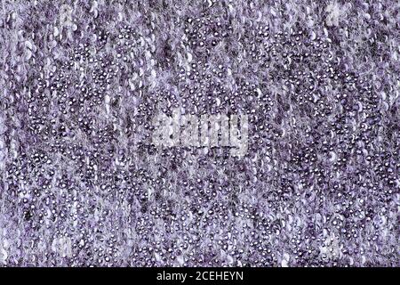 Close-up of mohair fabric textured cloth background. Purple knitted fabric texture Stock Photo
