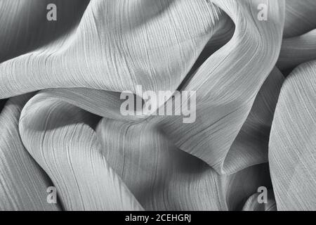 chiffon fabric background texture. pleated skirt fabric texture. closeup plisse fabric texture pattern Stock Photo