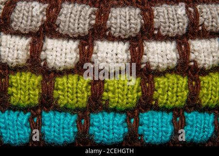 Colorful mottled and speckled thread knitting wool texture background. Stock Photo