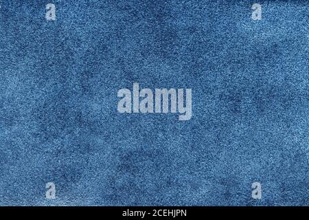 Blue suede soft leather as texture background. Old leather. Navy chamois texture. Fluffy and soft shammy-leather. Close up shammy leather texture Stock Photo