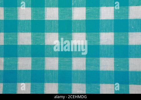 The texture of checkered fabric as a background. Checked fabric tablecloth. Fabric in a large square. Texture plaid fabric Stock Photo