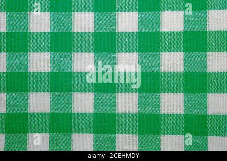 The texture of checkered fabric as a background. Checked fabric tablecloth. Fabric in a large square. Texture plaid fabric Stock Photo