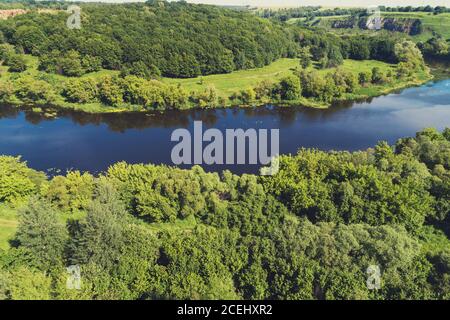 Landscape with a river on a sunny day. View from above. Beautiful nature of Norway. Europe Stock Photo