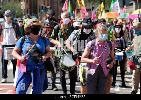 Cardiff, Wales, UK - Tuesday 1st September 2020 - Extinction Rebellion ( XR ) protesters march through the city centre of Cardiff en route to Cardiff Bay, protesting against climate change and the future of society. Photo Steven May / Alamy Live News Stock Photo