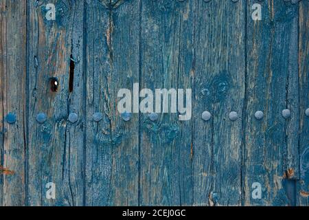 Fragment of an old wooden door in Alberite de San Juan, Spain. Stock Photo