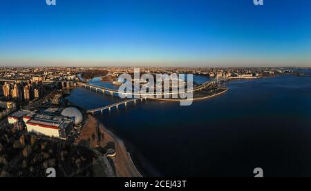Beautiful view to new Stadium Zenit - Arena, highway, Gulf of Finland, Pedestrian bridge on sunny summer day. Top panoramic view aerial drone. St Stock Photo
