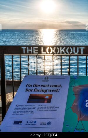 The sun setting over the sea at Hunstanton - on the east coast but facing west. Stock Photo