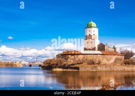 Sightseeing of Russia. Beautiful spring view to historical Vyborg ancient castle - medieval, famous fort in Vyborg town, a popular architectural Stock Photo