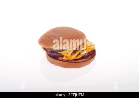 McDonald’s triple cheeseburger on white Stock Photo