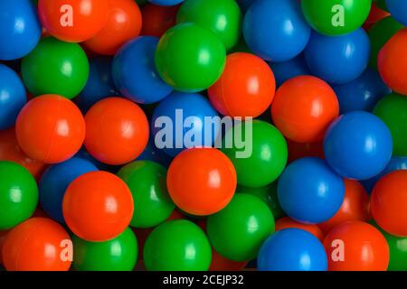 Playground Plastic Ball Pit Background Close Up. Stock Photo