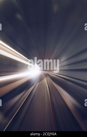 Glowing abstraction of fast moving with spiral lines of speed Stock Photo