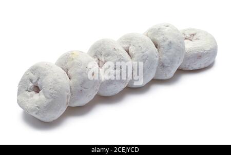 Row of Powdered Donuts Isolated on White. Stock Photo