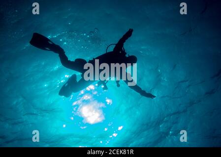 diver descends into the depths of the ocean, fuerteventura Stock Photo