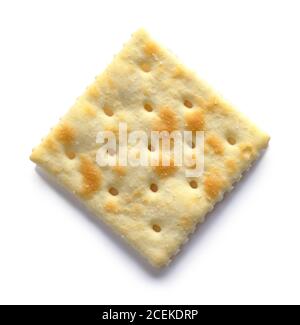Single Saltine Cracker Top View Isolated on White. Stock Photo
