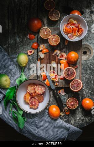 Peeled blood oranges in bowl Stock Photo