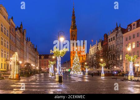 Christmas tree and illumination on Long Market Street and Town Hall at night in Old Town of Gdansk, Poland Stock Photo