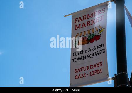 Jackson, Wyoming - June 26, 2020: Sign and banner for the Farmers Market on the Jackson Town Square on Saturdays Stock Photo