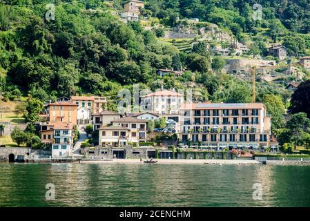 Lake Como. Italy - July 21, 2019: Hotels and Buildings at Shore of Lake Como.