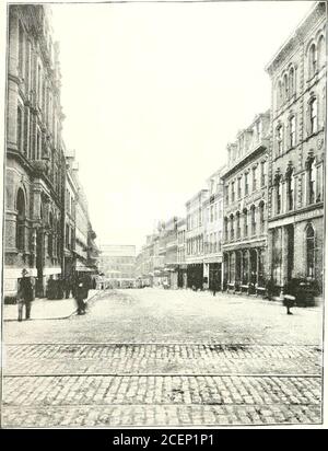 . Portland [Me.] its representative business men and its points of interest. ee that the most power-ful vision could not detect atrace of them unaided ; andeven through the glass they look like fragments of cloud, and so dream-like and poetical, that the moststernly practical man may be pardoned for forgetting for an instant that they are all American or foreignbottoms of a certain amount registered (and about twice as much actual) tons burden. Inland, theview is more varied, if not more beautiful, it comprising the picturesque country about Portland, andstretching far away to the White Mounta Stock Photo