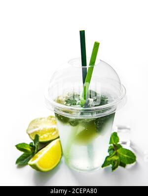 Mojito cocktail with lime and mint on white background Stock Photo